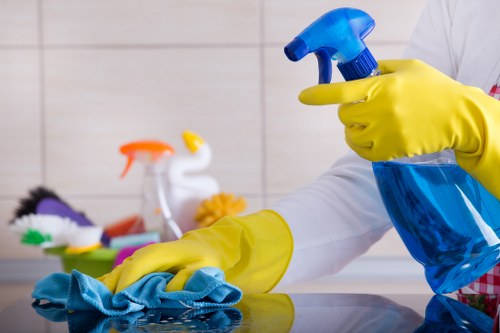 Technician working carefully around a carpeted area in a home