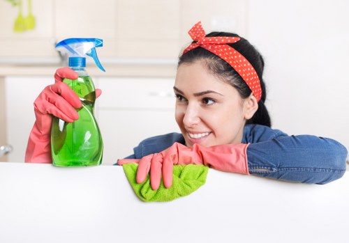 Local technician treating a carpet stain in an N4 property
